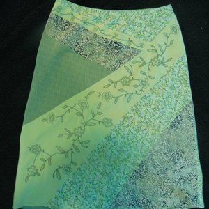 Patchwork embroidered floral green A-line skirt.